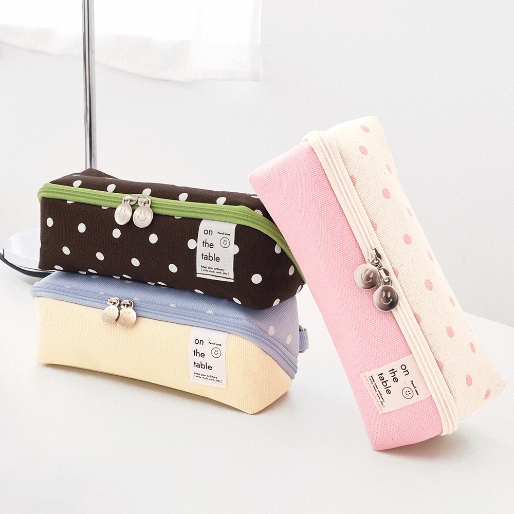 on the table cube pencil case dot
