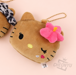 Tanned Hello Kitty Face Mirror Keychain